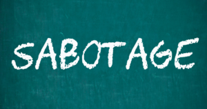 White chalk lettering spells 'SABOTAGE' on a teal chalkboard.